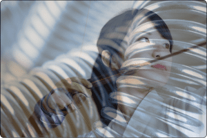 Spring under tension