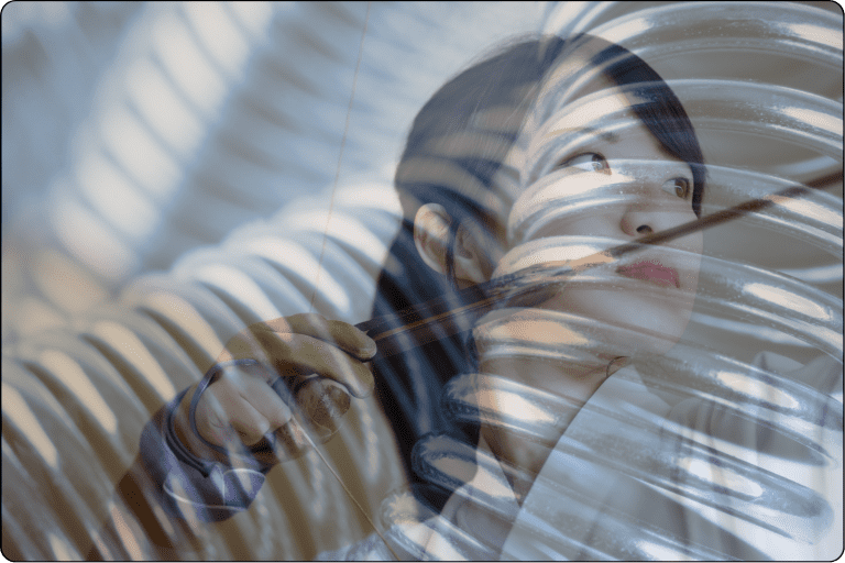 Spring under tension